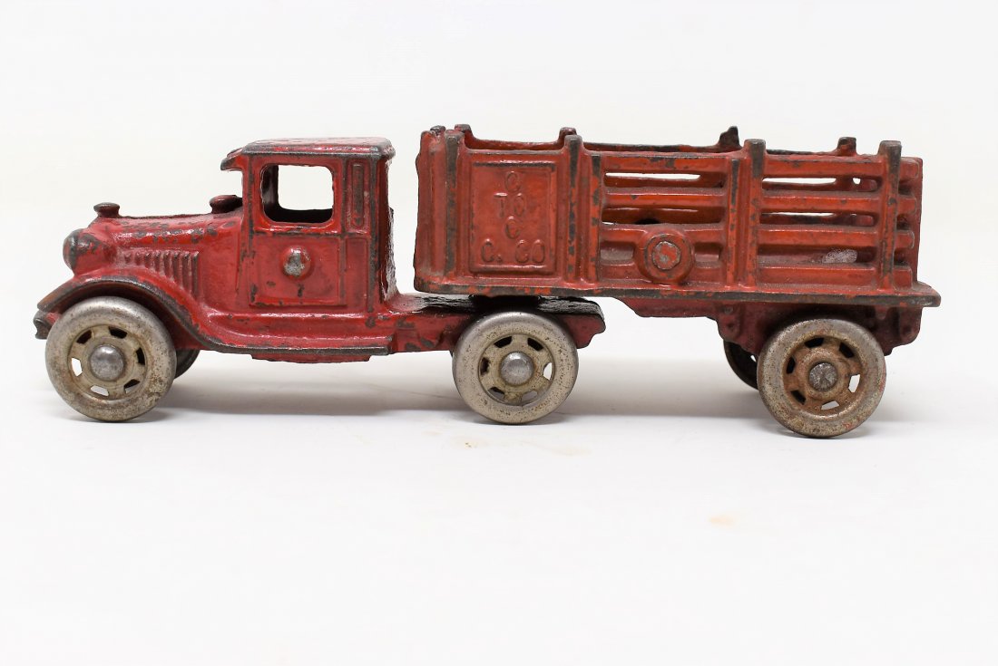 A C Williams Coast to Coast Cartage Co Truck & Trailer: This is either an Arcade or A C Williams 7" Cast Iron Truck Trailer semi Coast to Coast Cartage Co - As shown condition, please see the Photos Has a broken part to the front bumper