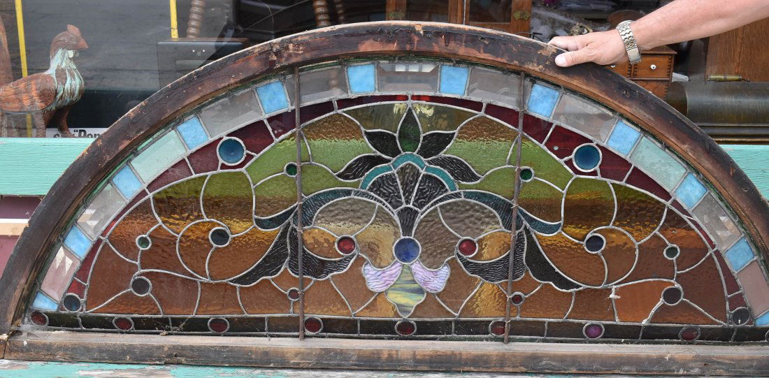 Antique Stained Glass Window: measures 69" x 27.5" framed