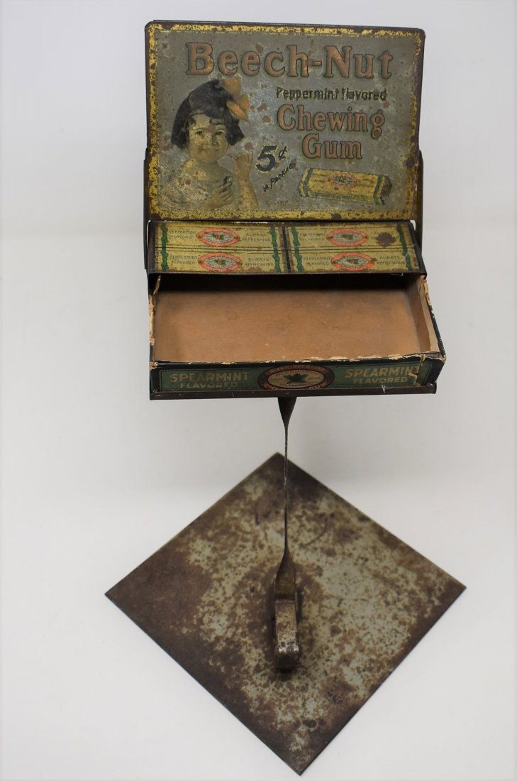 Beech-Nut Peppermint Chewing Gum Countertop Display: Circa 1910. The pedestal is metal and the display sign and rack is beautifully detailed tin litho. Complete with a well worn spearmint display box. Size 13.25" T.