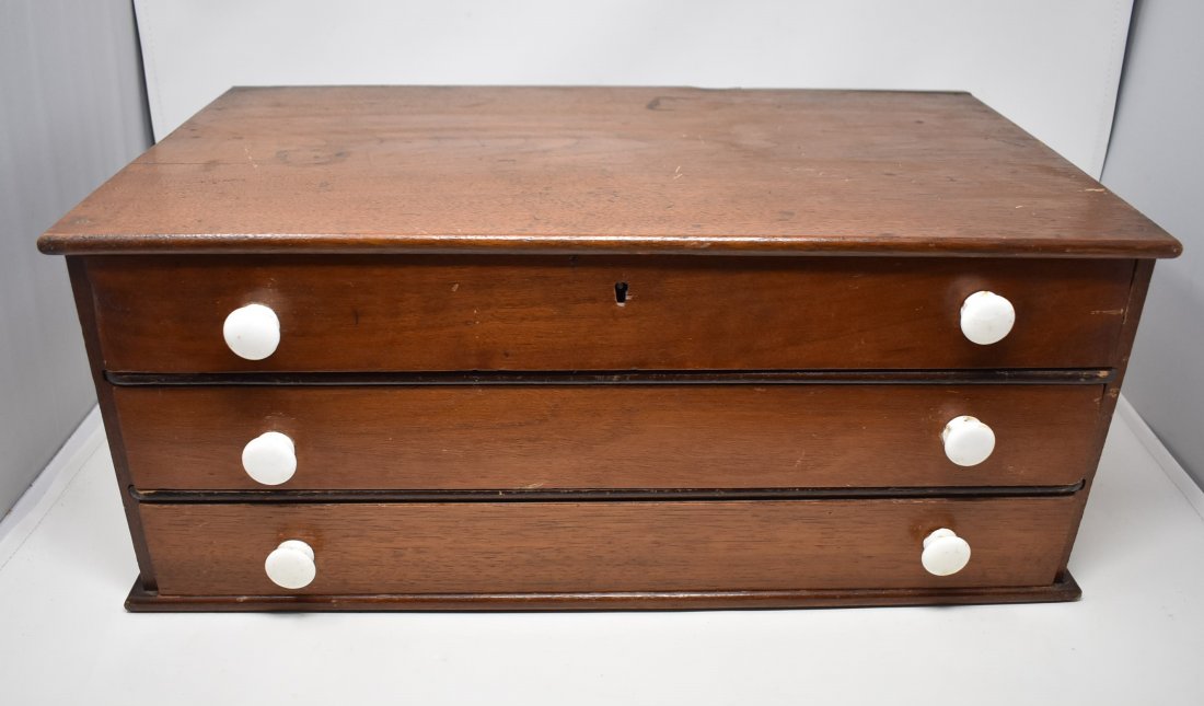 Antique Primitive Spool Cabinet: Antique 3-Drawer Spool Cabinet. Has porcelain pulls, measures 20.5" x 12" x 8.5"