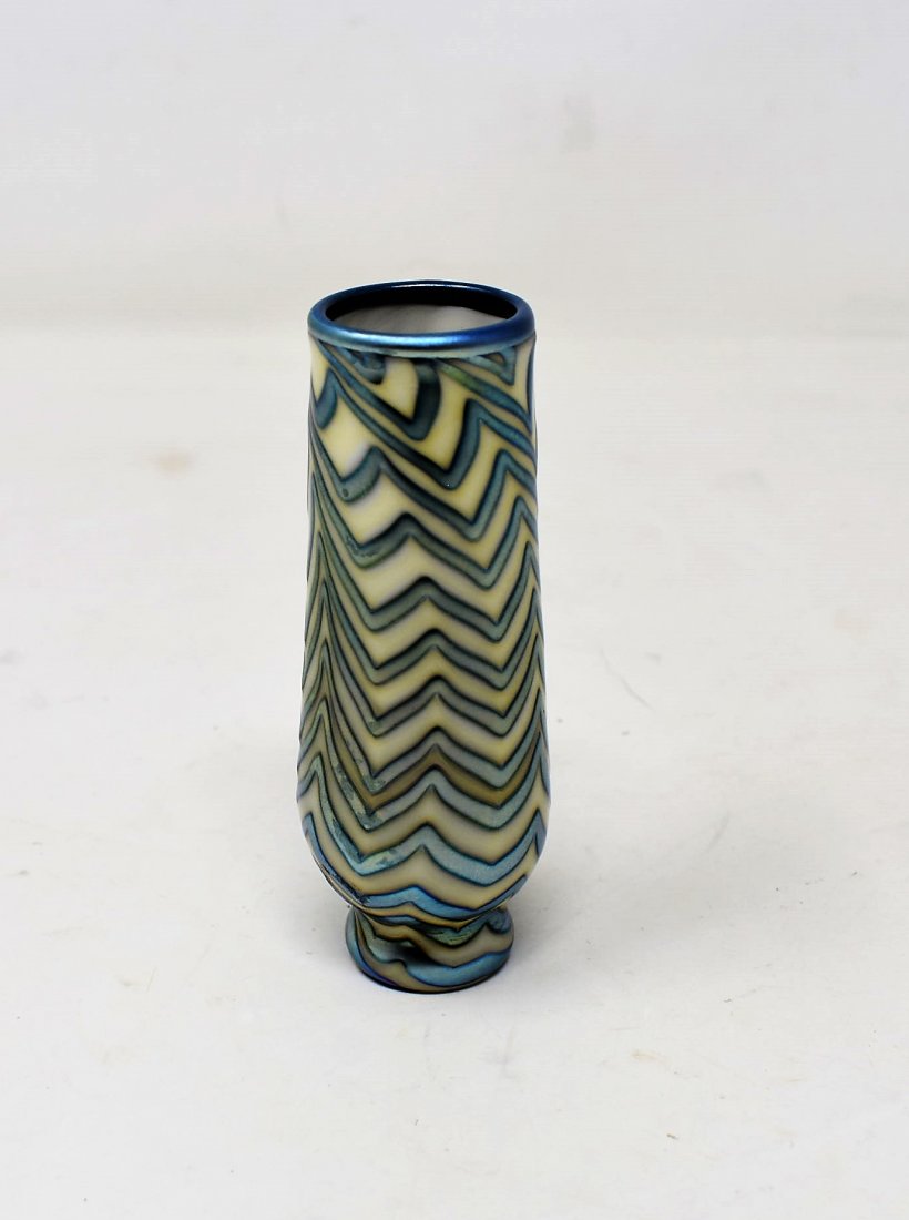 Charles Lotton Mini Iridescent King Tut Art Glass Vase: Lotton Art Glass Iridescent Mini King Tut Vase. It measures 3.5" tall and is signed "Charles Lotton 1983". It comes in excellent condition.