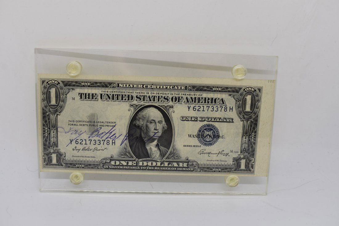 1935 Off Center Cut $1 Silver Cert signed Ivy Priest: 1935 $1 Silver Certificate, Off Center Cut, hand signed by Treasurer Ivy Baker Priest. Has creases from being folded.