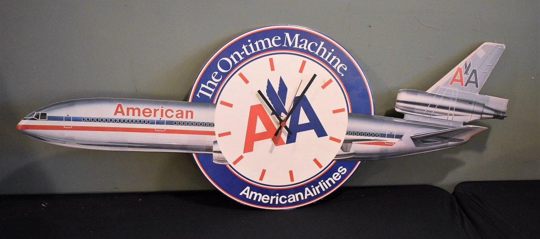 Vintage American Airlines Advertising Clock: Vintage American Airlines Airplane Clock, made of cardboard and battery operated. It measures 36" long. RARE