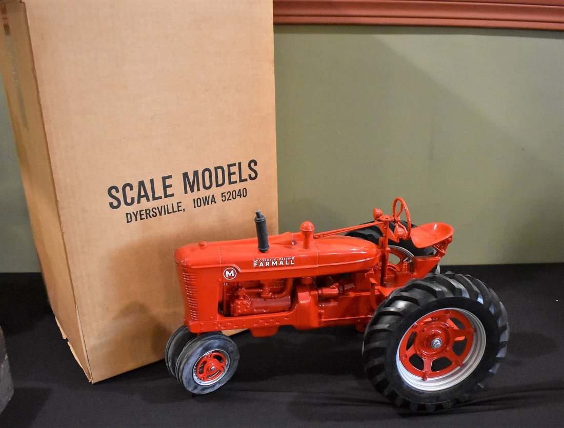 Scale Models 1/8 Farmall Tractor NEW: Vintage Scale Models 1/8 Scale McCormick Deering Farmall Tractor, measures 17" x 11". Comes new in box.