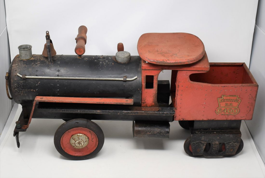 Keystone MFG. R.R, Railroad 6400 Ride On Toy Train: Keystone MFG. R.R, Railroad 6400 Ride On Toy Train - missing one metal rod on the side of the train, as shown, and has surface rust as shown. works and is usable, rubber is NOT Brittle, bell clinker i