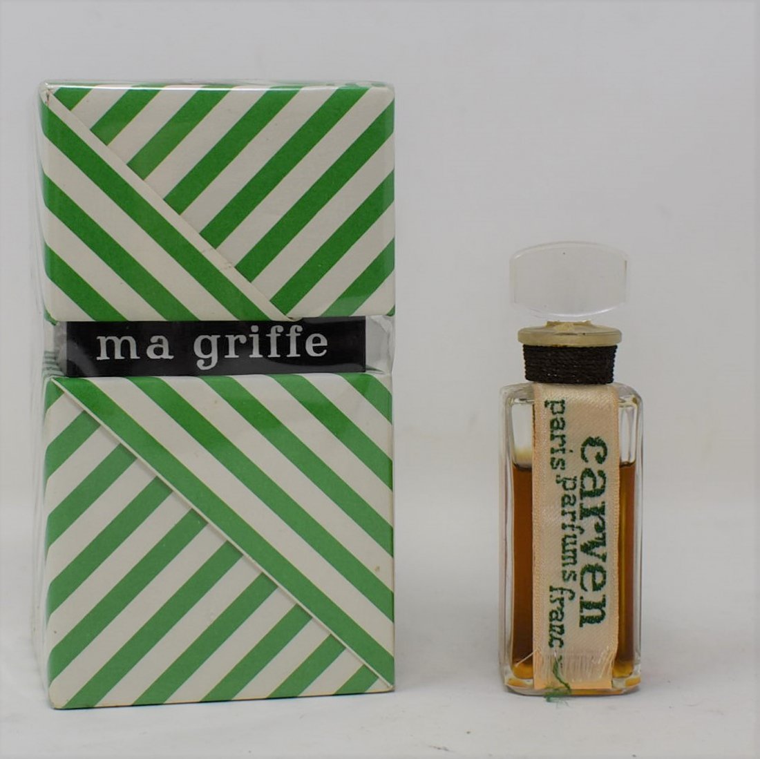 2 Bottles Vintage Carven Ma Griffe Paris Parfum NEW: 2 Bottles of Vintage Carven Ma Griffe Paris Perfume, new and sealed in box and 1/2 oz sealed and unboxed bottle (has some evaporation?).