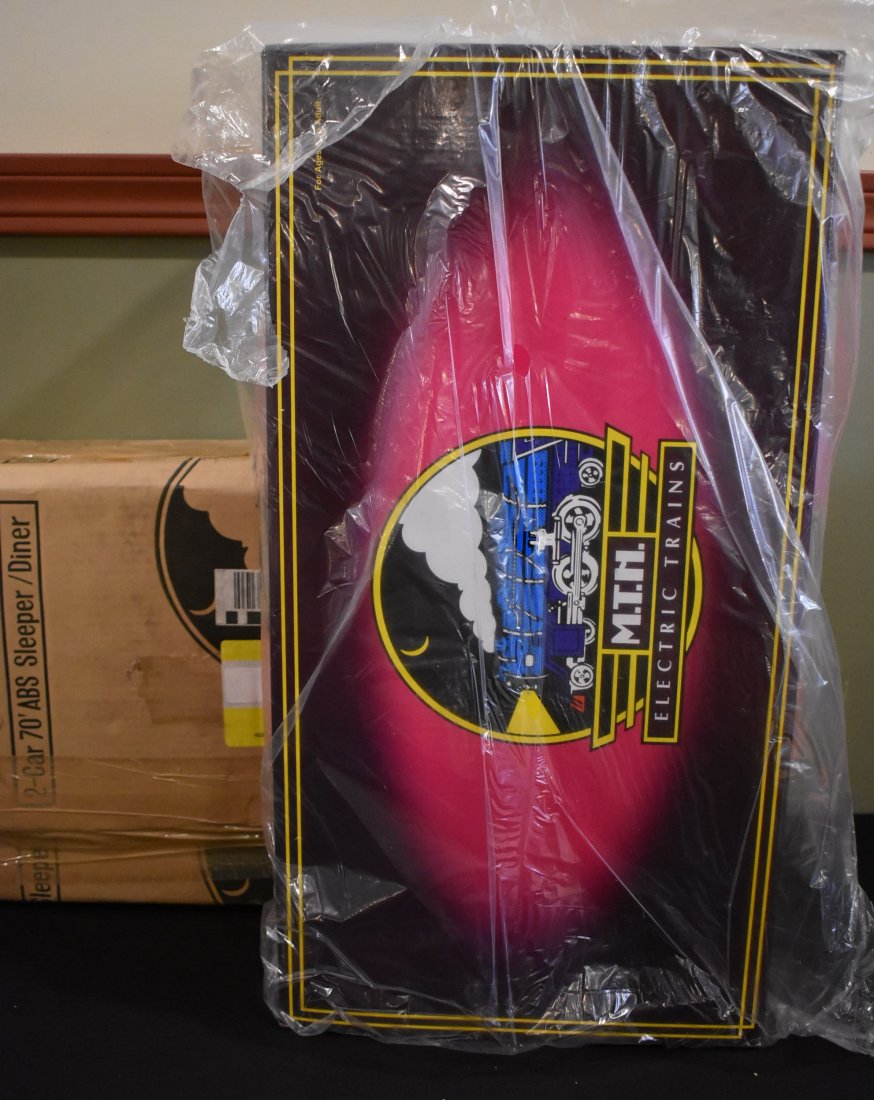 MTH 20-6634 Electro-Motive Div. 2 Car Passenger Set NEW: MTH O Scale 20-6634 Electro-Motive Division 2 Car 70' ABS Sleeper/Diner Passenger Set. It comes brand new in box with Shipper.