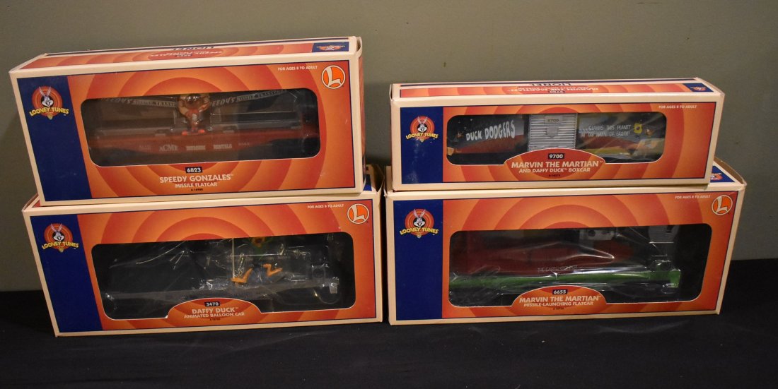 4 Lionel Looney Tunes Cars: A Lot of 4 Lionel Looney Tunes Cars, in boxes.