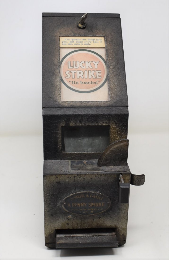 Smok-a-taire A Penny Smoke Cigarette Machine: Smok-a-taire - A Penny Smoke - Coin Operated Cigarette Dispenser Vending Machine/Trade Stimulator made by General Metal Products co St. Louis Mo. Loaded w/ Lucky Strikes - works w/ Key.