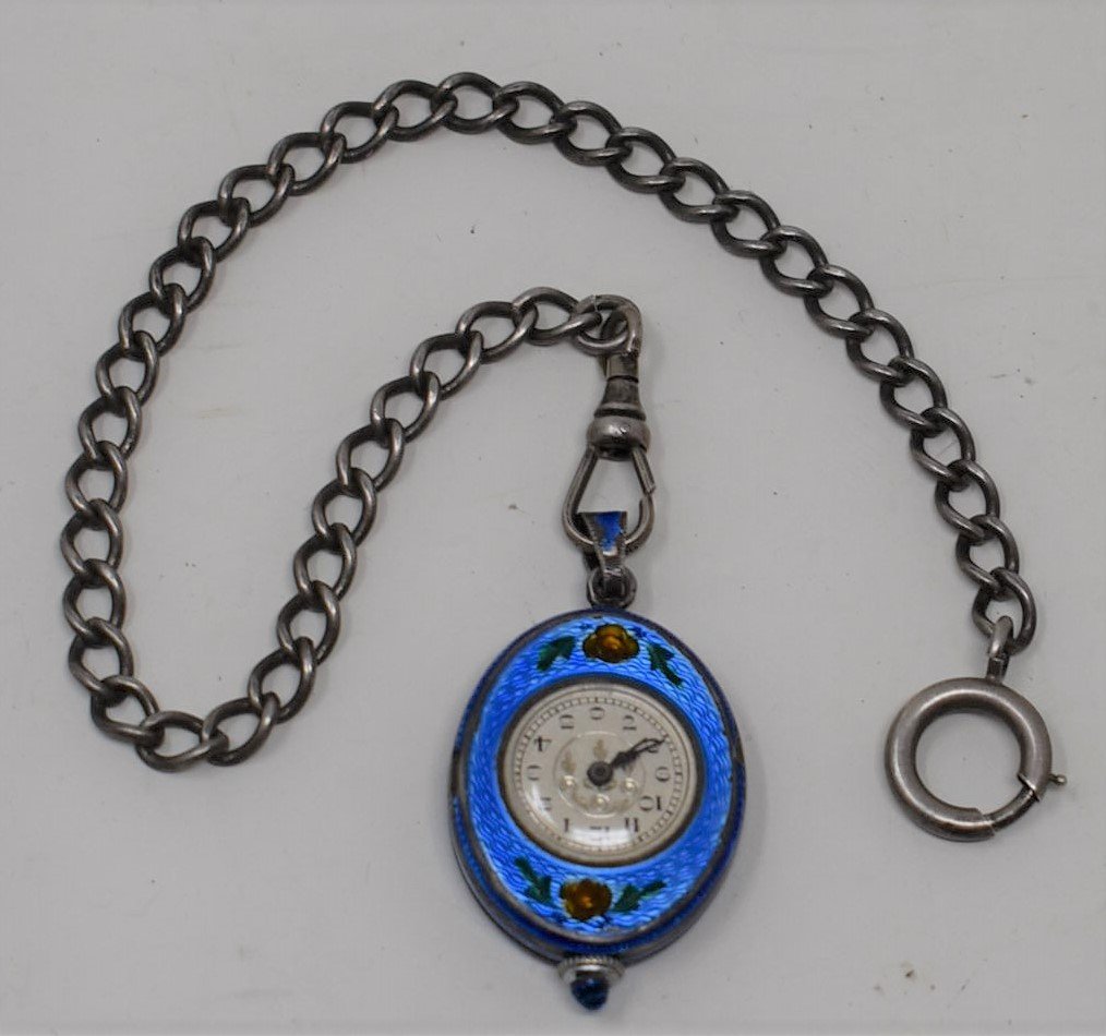 Albus Watch Co. 15 Jewel Sterling Silver Enamel Pendant: Antique Albus Watch Co. 15 Jewel Sterling Silver Enamel Pendant Patch on a sterling Sliver Watch Fob. Watch is overwound and there are some dings as shown in the pictures.