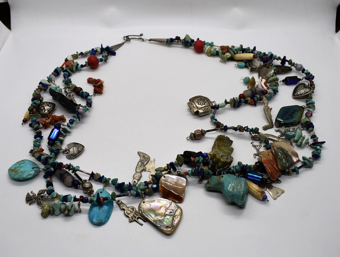 Large Turquoise and Sterling Silver Fetish Necklace: Stunning Double Strand Sterling Silver and Multi-Stone Fetish Necklace. It measures over 30" long and has incredible detail.