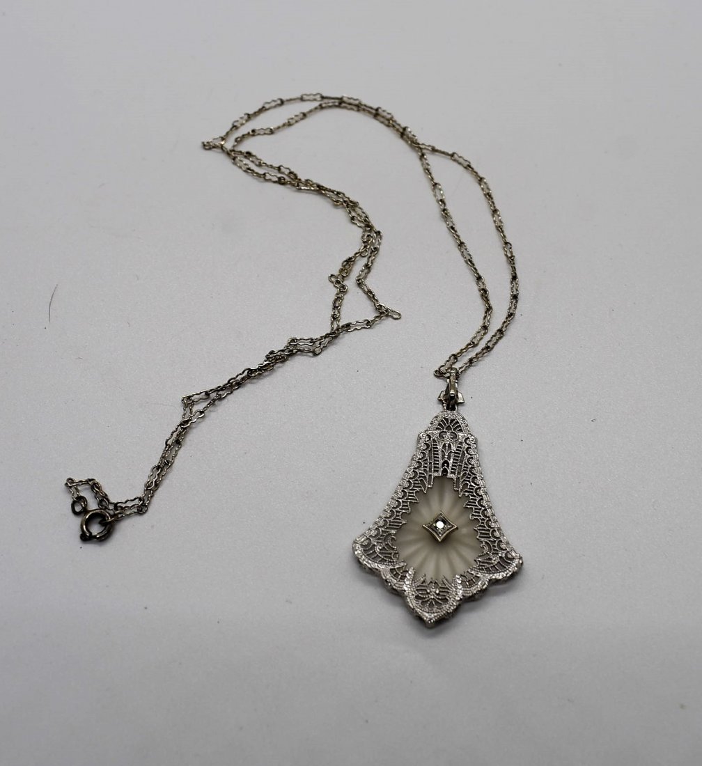 Stunning Victorian 14K Gold Filigree & Diamond Necklace: Victorian 14K White Gold Filigree, Camphor Glass and Diamond Necklace. The Pendant measures 2" long and comes on a delicate 24" sterling chain. Stunning Necklace!