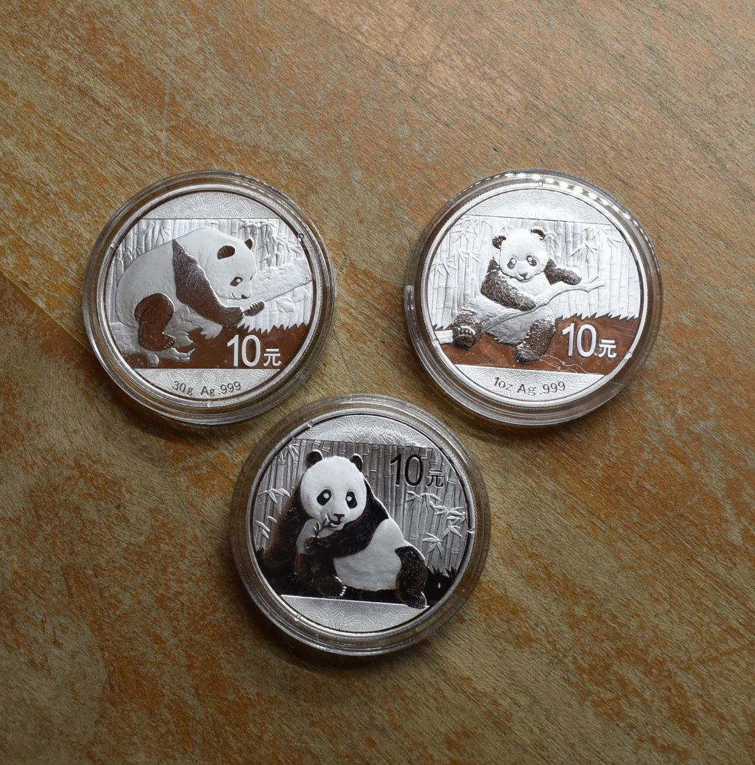 Lot of 3 1oz Silver Panda Coins 10 Yuan: A Group of 3 1oz .999 Silver Pandas, 10 Yuan, 2014, 2015 & 2016. All are uncirculated.