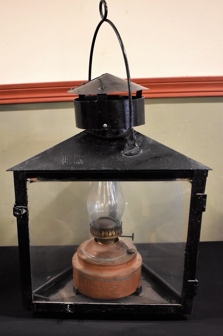 USLHS Large 2 Piece Maritime Lighthouse Lantern: Antique USLHS Maritime Lighthouse Lantern with both the interior and exterior pieces. Both are marked "USLHS" and come in nice condition. Measures 22" tall