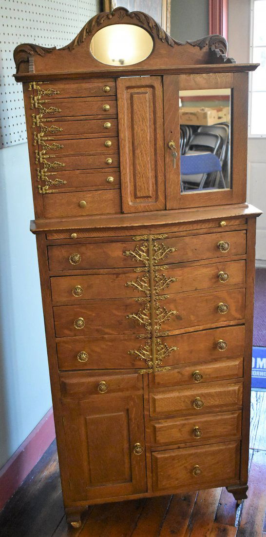 Antique Ornate Ransom & Randolph Oak Dental Cabinet: This is an outstanding rare Ornate Oak Dental Cabinet that dates to the early 1900's. Made by Ransom & Randolph Co from Toledo Ohio, this piece is simply amazing and features 17 drawers, two doors, a