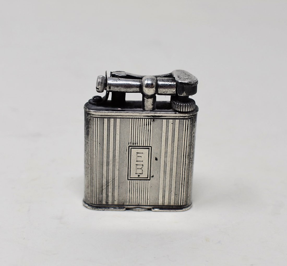 RARE Dunhill Paris Sterling Straight Arm Lighter: RARE Sterling Silver Dunhill Paris Straight Arm Lighter. It measures 1.75" tall