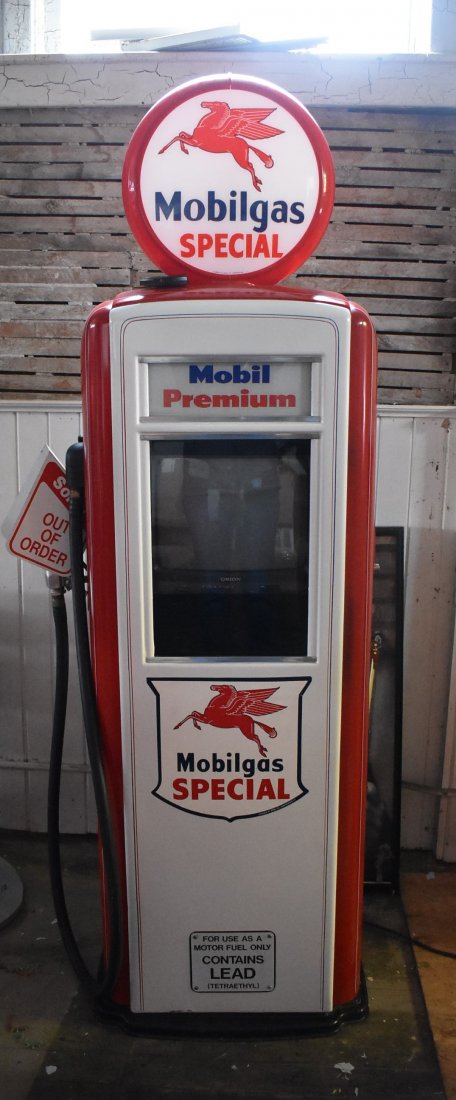 Vintage Mobil Gas Pump Restored: Vintage Mobil Gas Pump Restored. The globe is not original and it has been electrified with a space for a TV in the middle. It measures 60" tall plus the globe and 20" wide. It looks great!