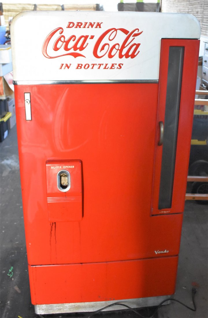Vintage Coca-Cola Bottle Soda Pop Machine: Vintage Coca-Cola Bottle Soda Machine. It measures 64" x 32" x 18.5"