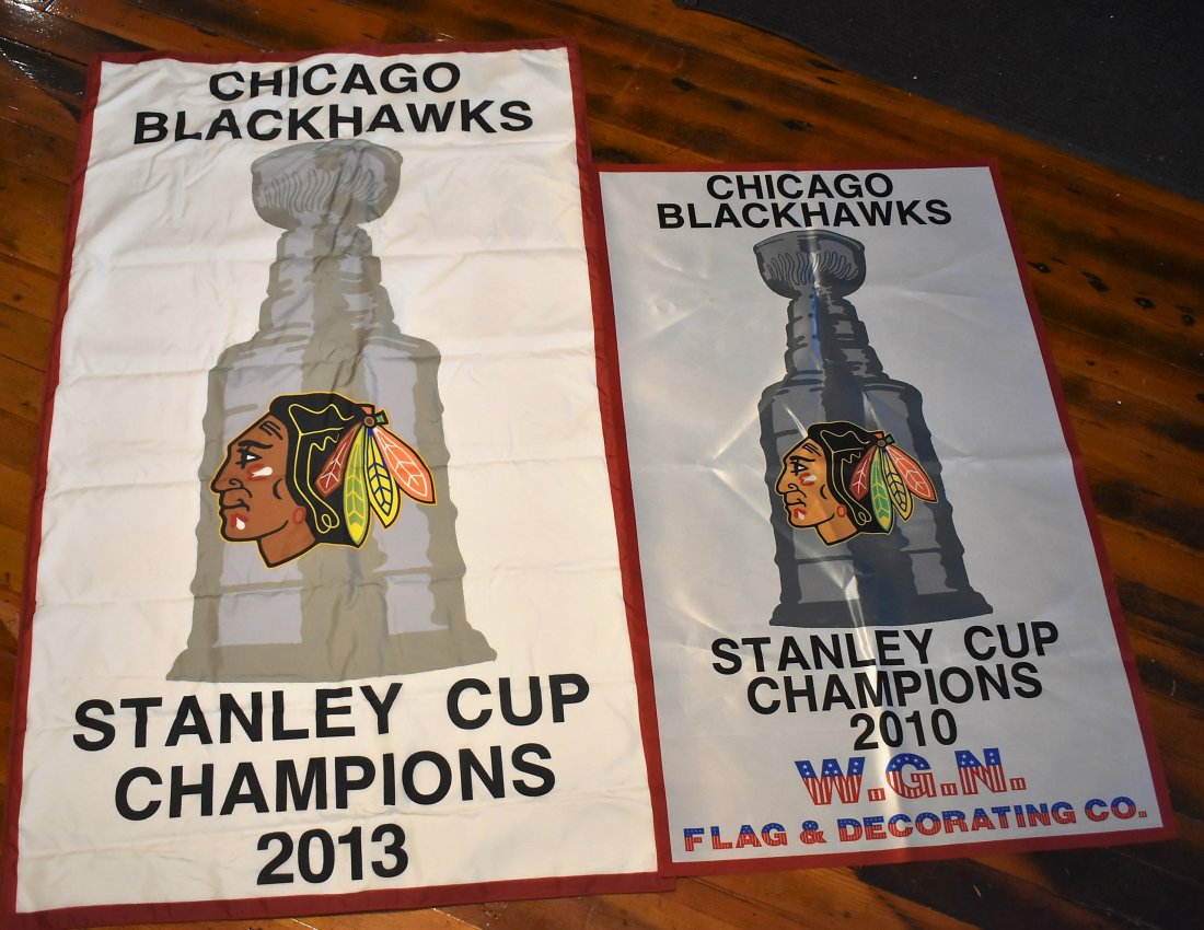 Pair of Salesman Sample Chicago Blackhawks Banners: A Pair of Salesman Sample Chicago Blackhawks Banners from W.G.N. Sign, the company who produces all of the banners for the United Center in Chicago. The Larger is 2-sided and measures 60\" x 36\", the
