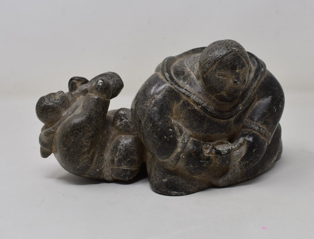 Carved Inuit Soapstone Sculpture: Carved Inuit Soapstone Sculpture, measures 7" x 3", signed 1416 Johnny