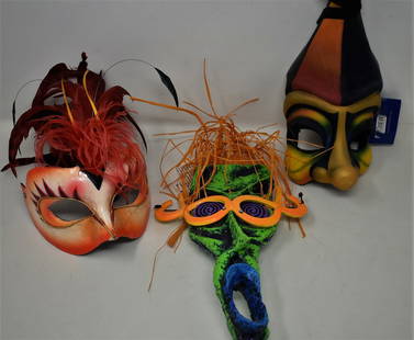 3 Decorative Masks Cirque du Soleil: Group of 3 Decorative Masks including 2 Cirque du Soleil and 1 Kolarart Creations.