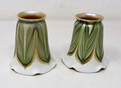 Vintage Pair of Iridescent Art Glass Lamp Shades: A Pair of Vintage Iridescent Art Glass Lamp Shades, unsigned. They measure 4.25" tall and are unsigned.