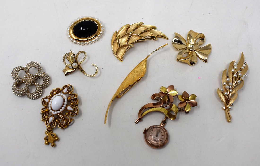 Lot of 9 Signed Brooches: A Lot of 9 Signed Brooches, as shown