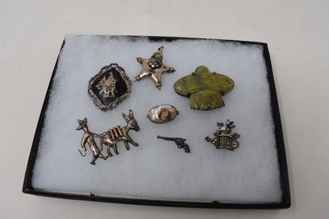 Lot of 7 Sterling Silver Brooches: A Group of 7 Sterling Silver Brooches, as shown