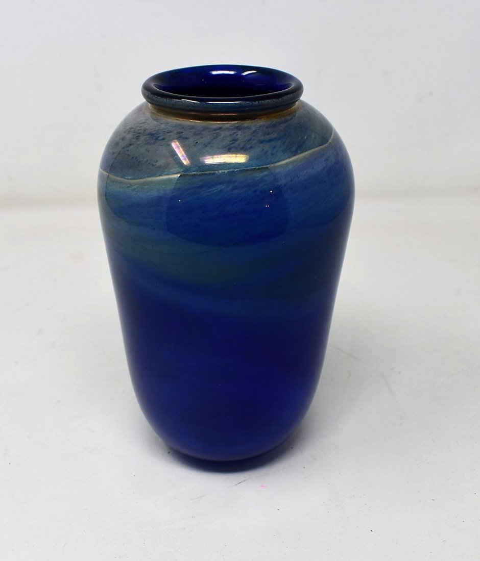 Don Gonzalez Art Glass Vase: Don Gonzalez Signed Art Glass Vase, Transparent Blue with Swirls, measures 7.5" tall