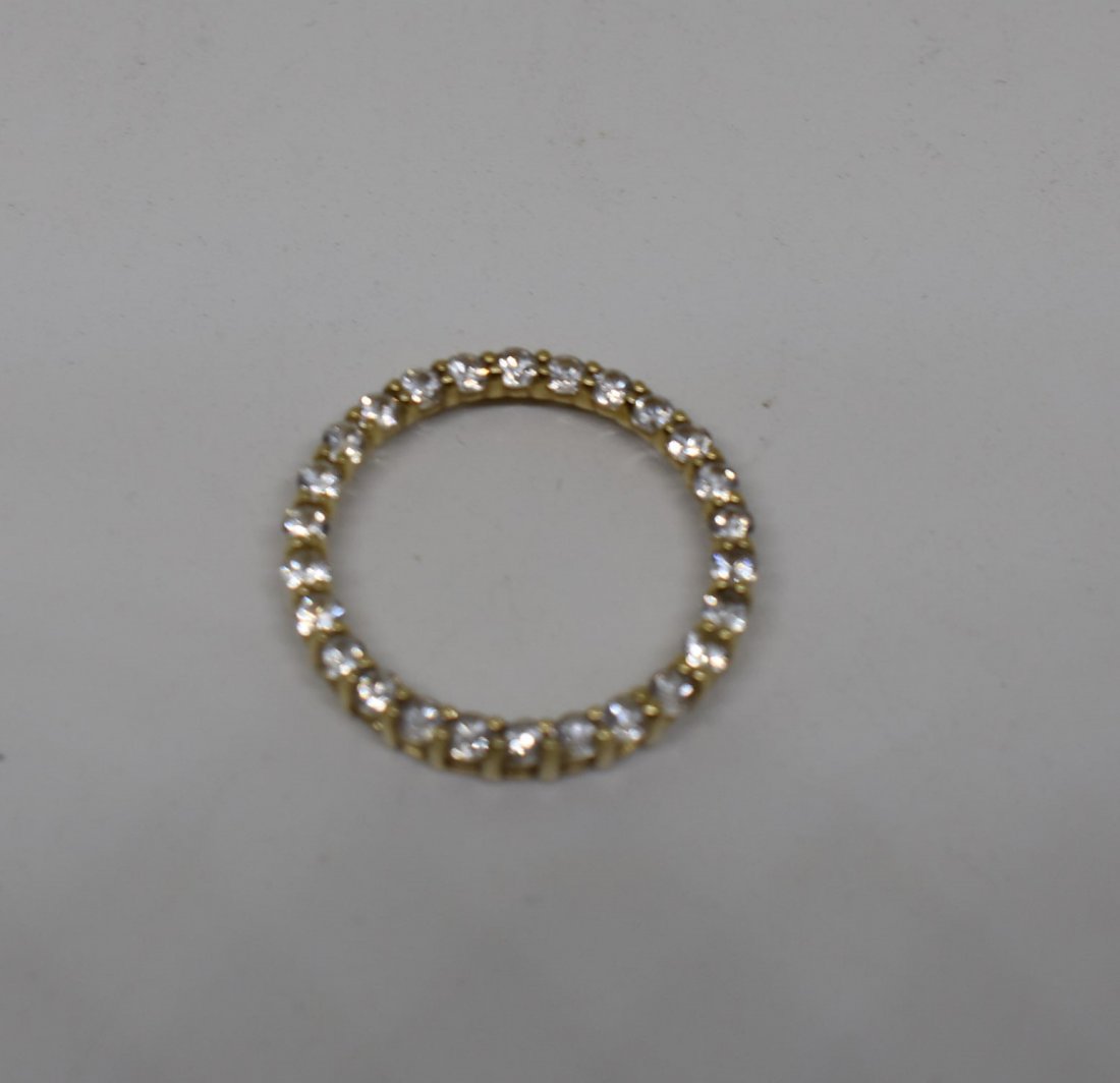 10K Yellow Gold Diamond Infinity Circle Pendant: 10K Yellow Gold Diamond (2 tcw) Infinity Circle Pendant. 2.5 grams