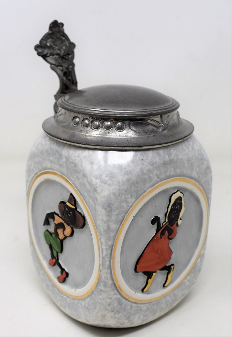 Rare R.M. Krause Majolika black americana stein 1/2 ltr: A fantastic 4 sided porcelain marbleized finish stein with side panels of african american children dancing. rare piece of black americana rarely seen in a stein. Art nouveau style lid, mint