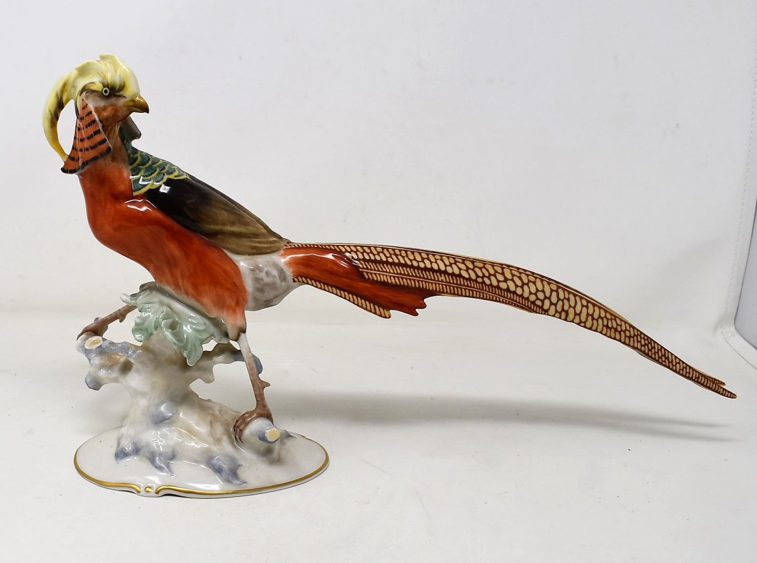 Beautiful Hutschenreuther Porcelain Pheasant: Beautiful Hutschenreuther Porcelain Pheasant Figure with amazing details. It measures 14" long and comes in excellent condition.