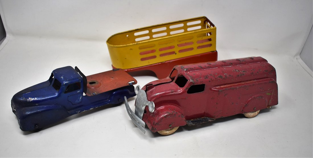 2 Vintage Tin Trucks with Trailer: A Group of 2 Vintage Tin Trucks 10" & 8" and one Tin Trailer 9".