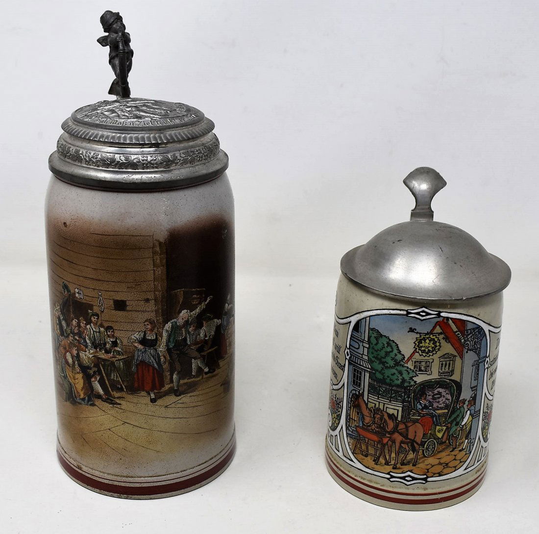 Pair of Pottery Beer Steins: A Pair of Pottery Beer Steins with Pewter Lids including a .5 liter and a 1 liter.