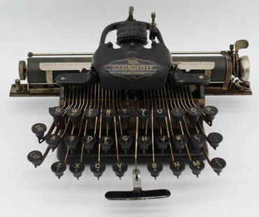 BLIKENSDERFER NO. 5 TYPEWRITER: A Blikensderfer No. 5 was the first Truly Portable Typewriter. made in 1892 and 1893. Portable Typewriter in original oak case w/o it's leather carrying handle which is missing. has original patent