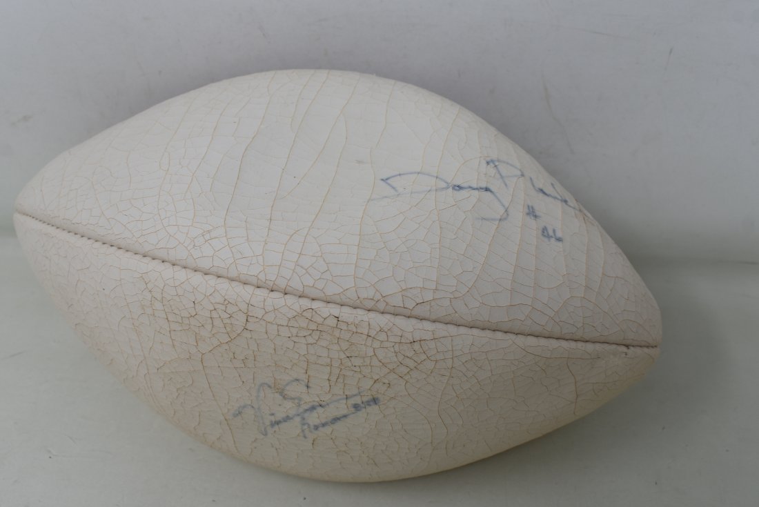 Doug Plank & Vince Evans Autographed Football: Doug Plank & Vince Evans Chicago Bears Autographed Football. No COA. Faded and cracked leather.