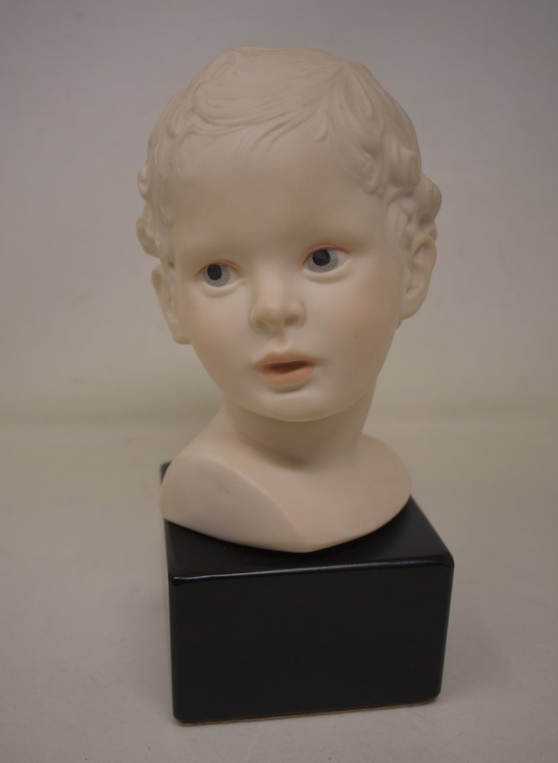 Cybis Porcelain Child's Bust: Cybis Porcelain Child's Bust on Wood Base. It measures 10" x 5" and comes in great condition with no damage.