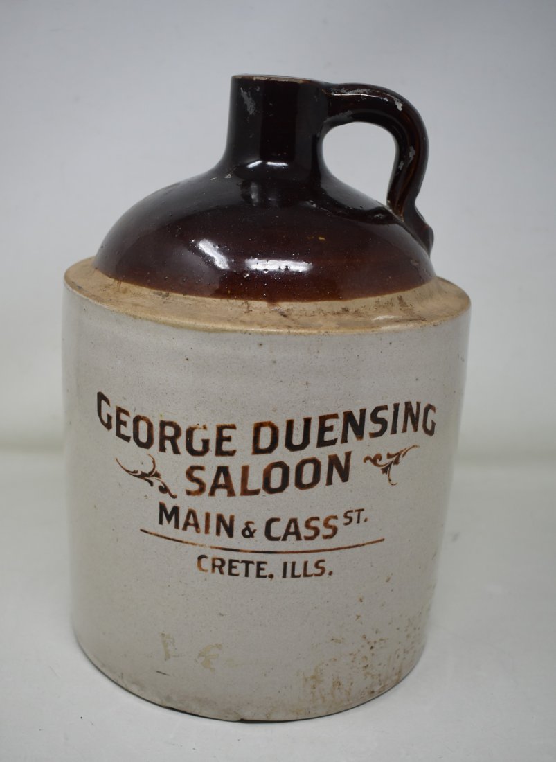Antique Wine Whiskey Jug Crete Illinois Advertising: Antique Wine/Whiskey Advertising Jug Crete, Illinois. It measures 12"x 8"x 8". Light wear