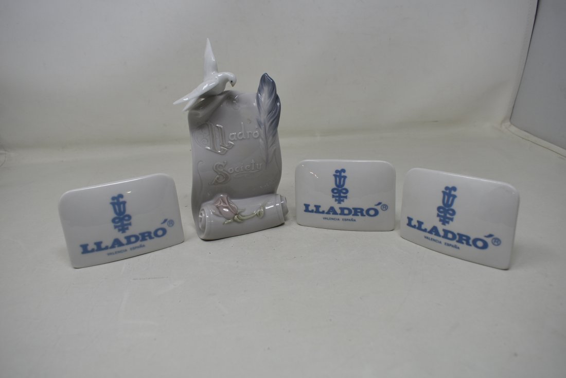 4 Lladro Porcelain Dealer Display Signs: 4 Lladro Porcelain Dealer Display Signs. In nice condition.