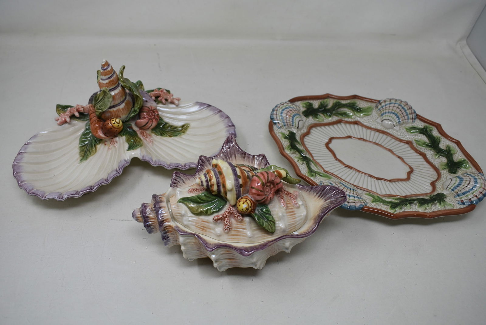 3 Pieces Fitz & Floyd Shell Design: 3 pieces of Fitz & Floyd Shell Design, a lidded shell, plate and 2 compartment bowl. In nice condition.