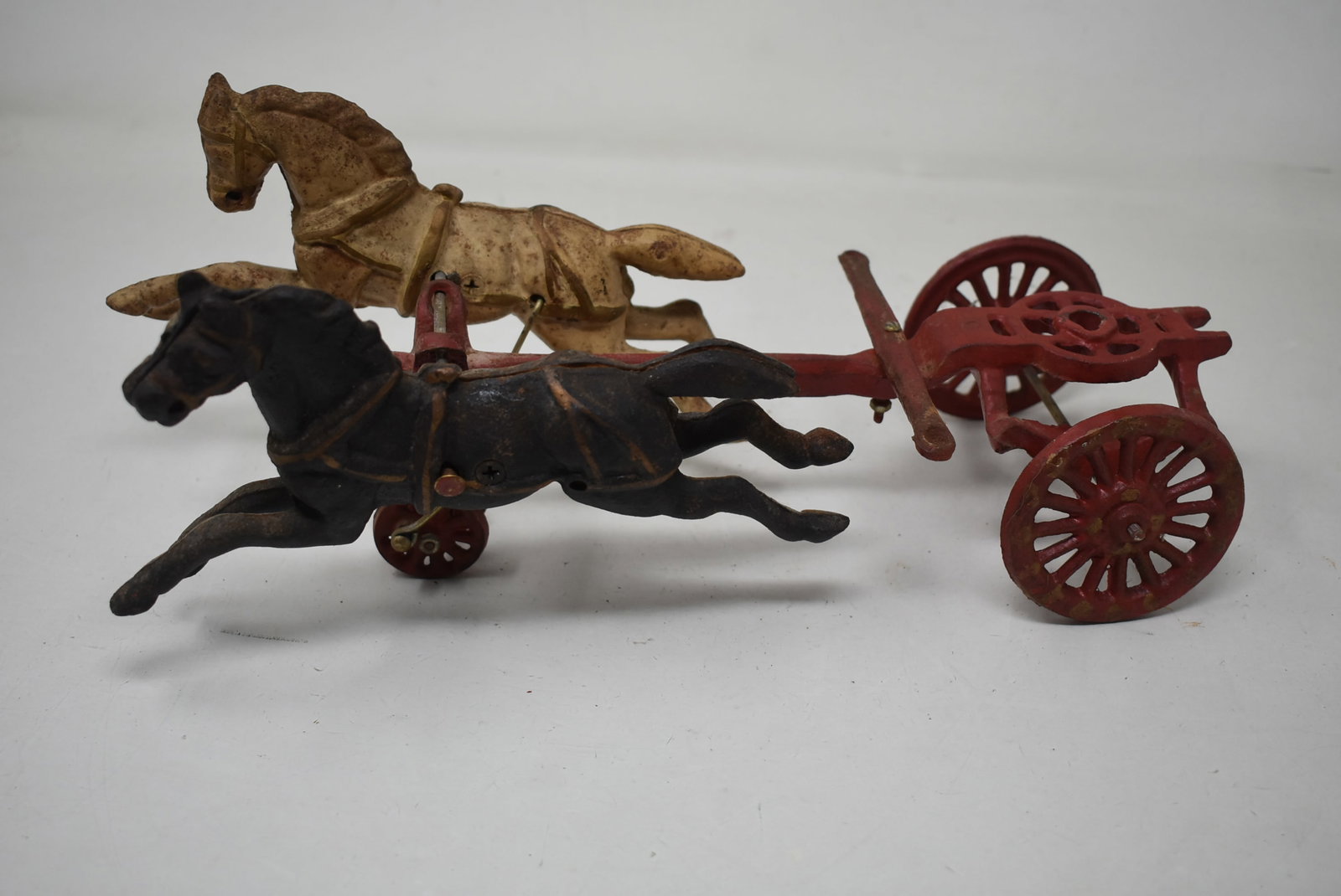 Vintage Cast Iron 2 Carriage Horses & Wagon: A Vintage Cast Iron 2 Carriage Horses and Wagon, 12". It is missing the driver.
