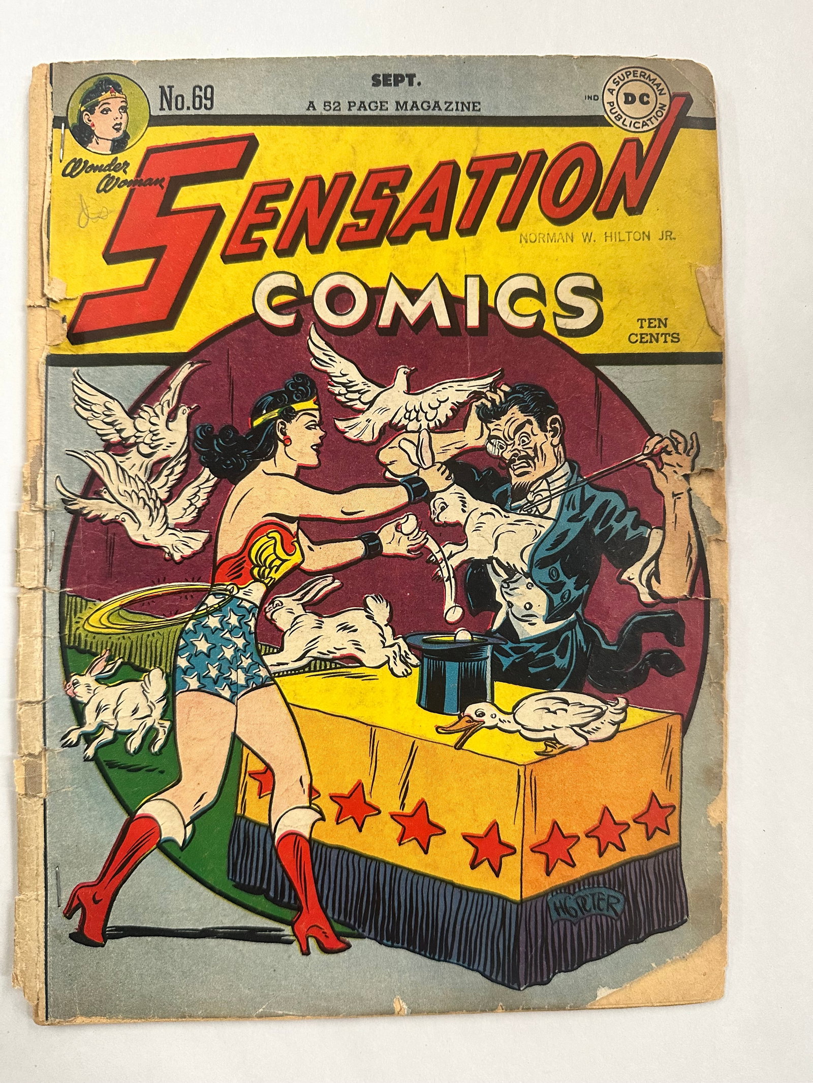 Sensation Comics #69 (1947) Wonder Woman: Sensation Comics #69 (1947) Wonder Woman - Chips, Tears, missing pieces, missing back cover, front cover re-attached, smell, cover stamp, wear & bends etc. as shown Please See the Photos for condition
