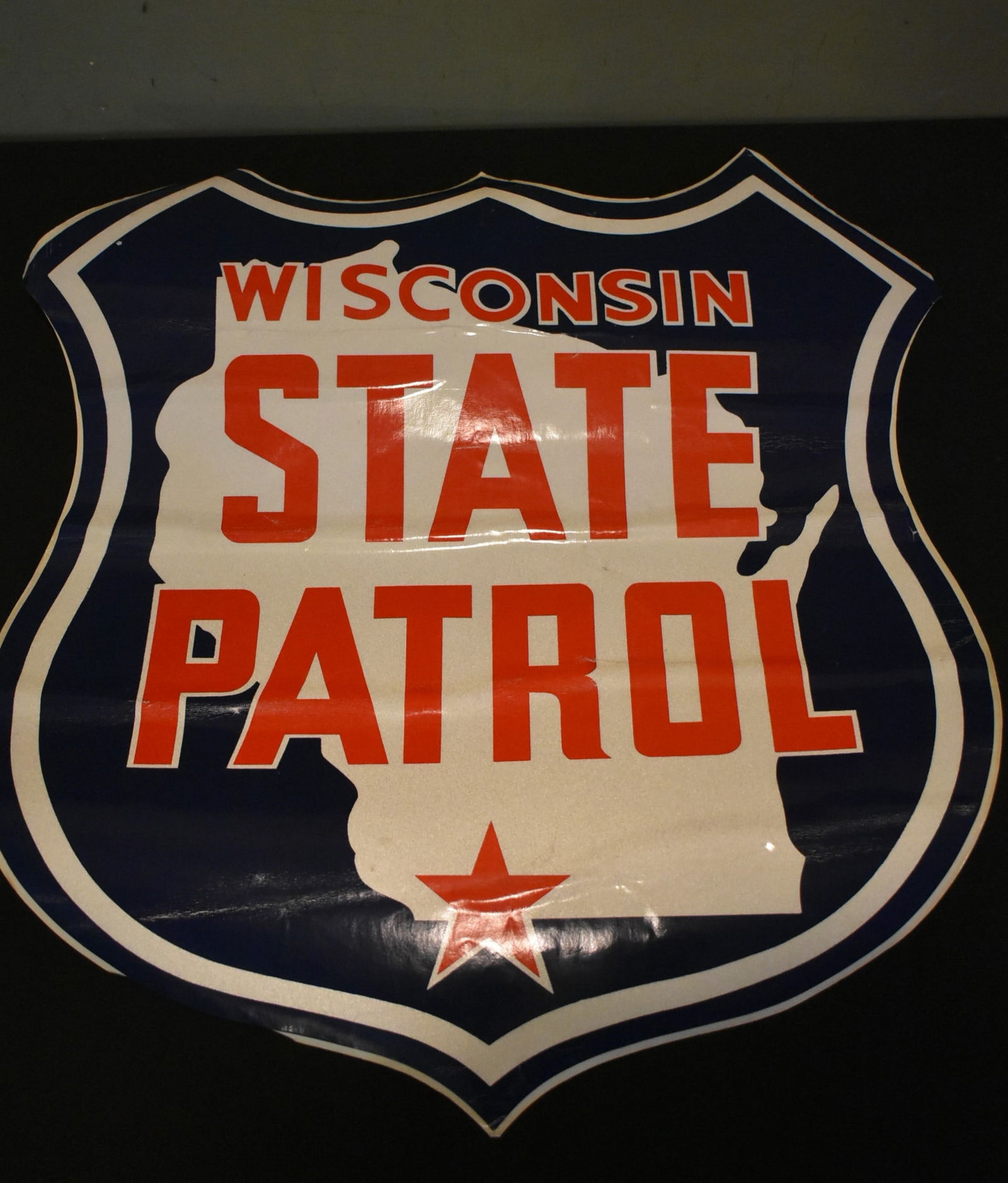 Vintage Wisconsin State Patrol Car Decal: Vintage Wisconsin State Patrol Car Door Decal, Unused. It measures 21" x 18". Has some creasing from rolled storage.