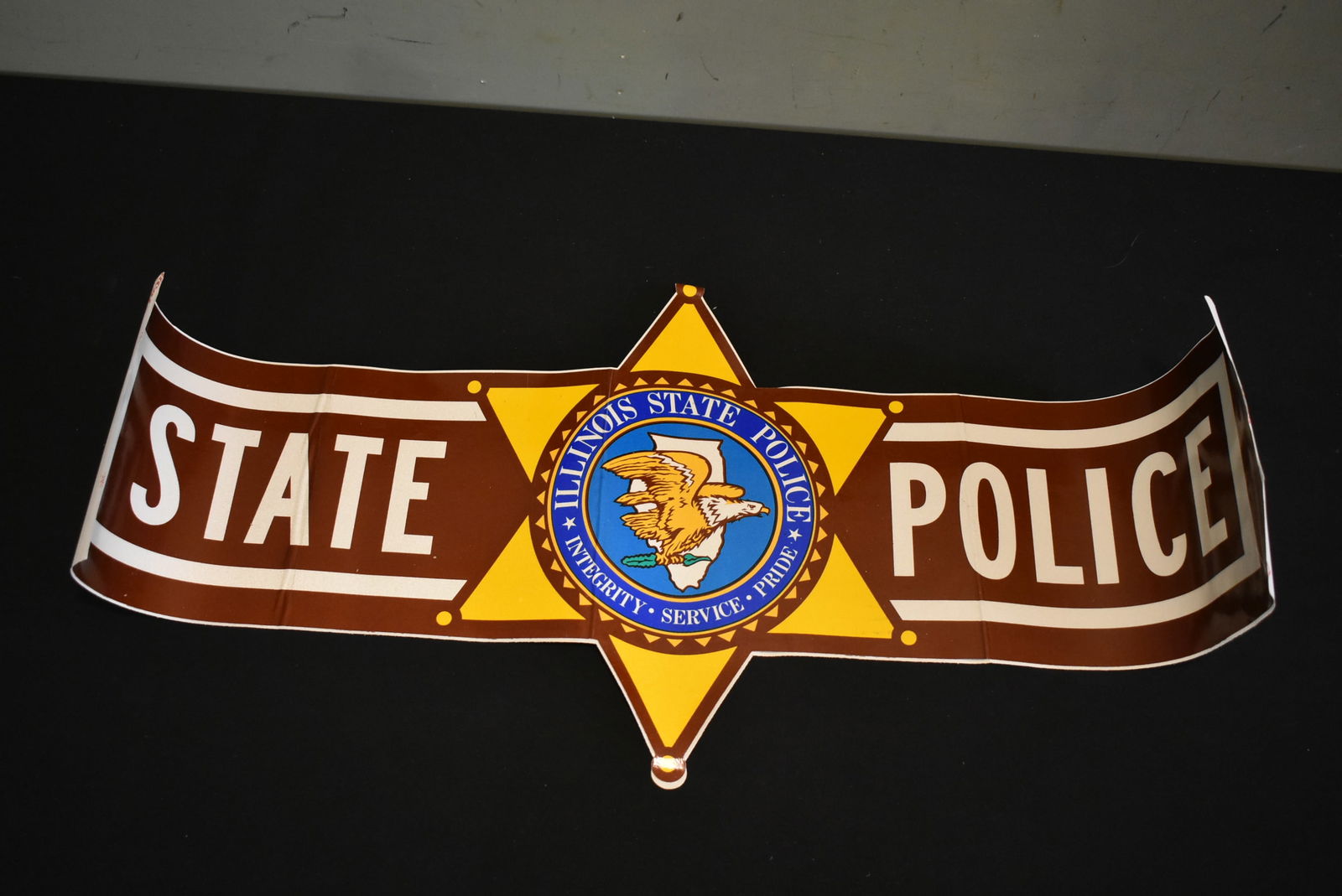 Vintage Illinois State Police Patorl Car Decal: Vintage Illinois State Police Decal, Unused. It measures 32" x 13". Has some creasing from rolled storage.