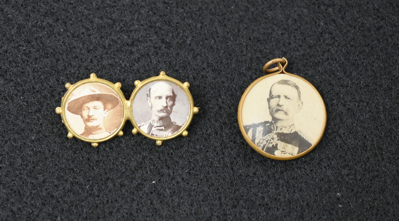 2 1899 Boer War Commemorative Pieces: 2 1899 Boer War Pieces including a 1.5" Double Pin and a Pendant. Good condition.