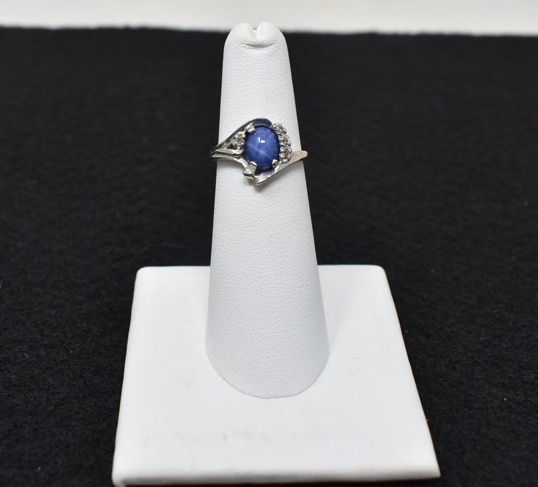 14k White Gold Blue Star Sapphire & Diamond Ring: 14k White Gold, Blue Star Sapphire & Diamond Ring, size 5. Weighs 2.7 grams