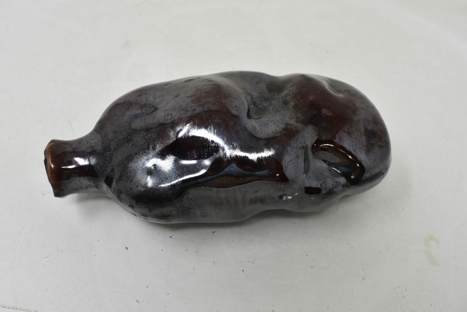 Early Figural Ceramic Nipper Bottle Flask "Potato": Early Figural Ceramic Nipper Bottle "Potato". 6" long and in nice condition.