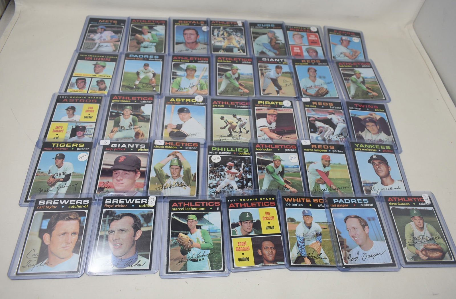 Group of 35 Topps 1970s Baseball Cards: A Group of 35 Topps 1970s Baseball Cards, kept in plastic.