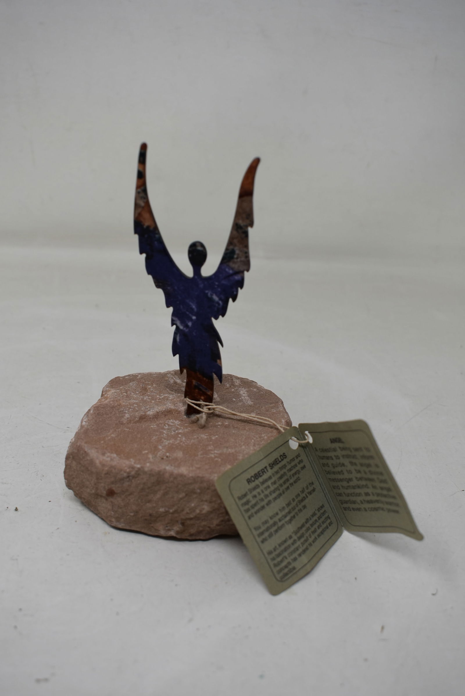 Robert Shields "Angel" Metal Sculpture on Stone Base: Robert Shields "Angel" 5" Sculpture on Stone Base. In excellent condition with tag.