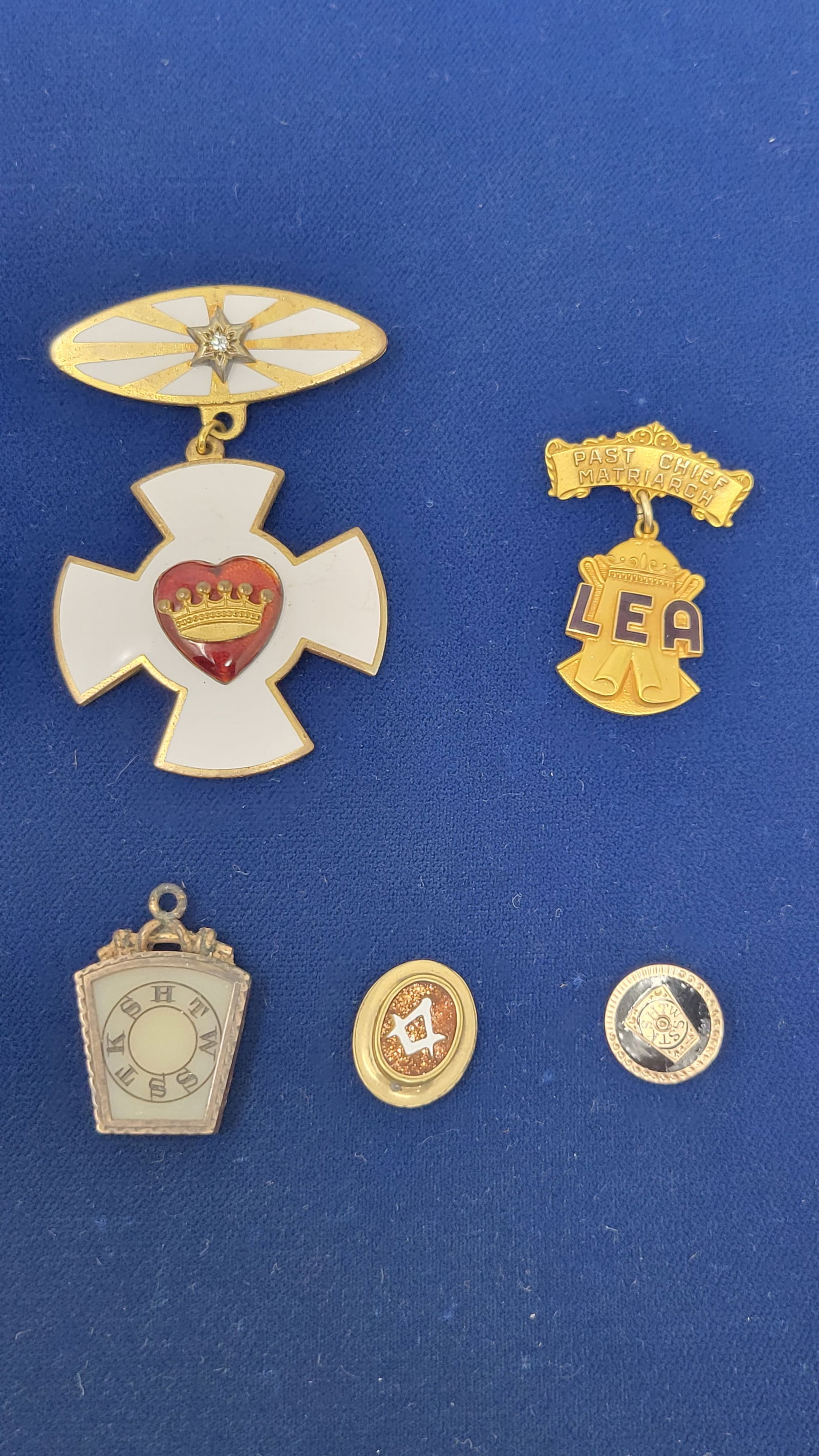 Collection of Vintage Masonic Odd Fellows Pins and Fobs: A Group of Vintage Masonic/Odd Fellows Pins and Fobs.